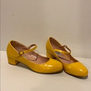 Yellow Mary Jane style pumps